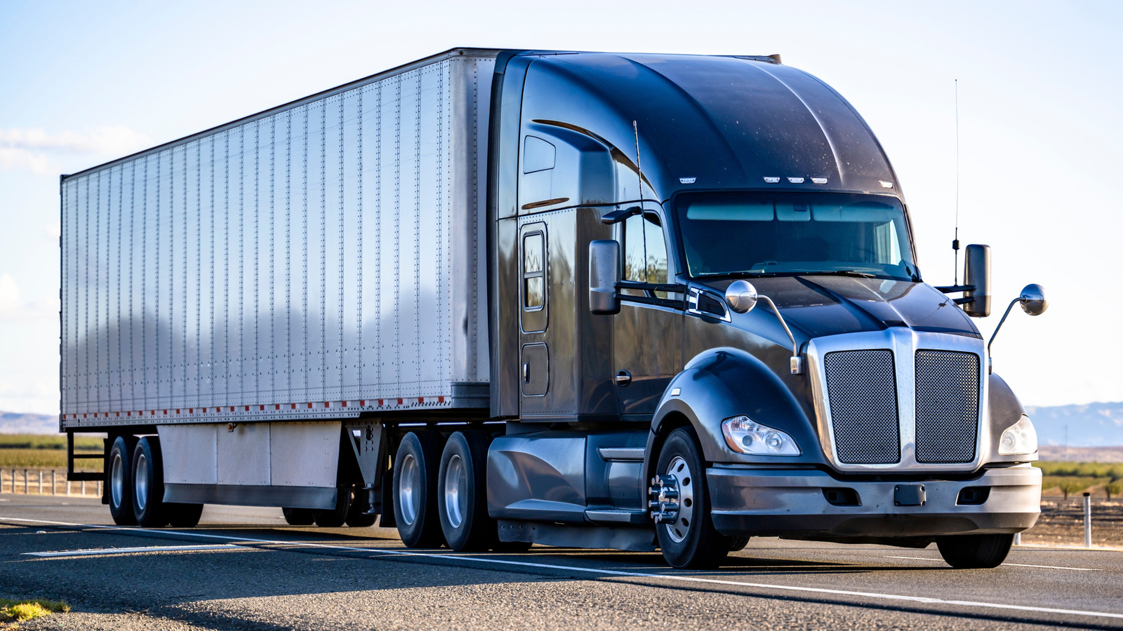 A N'H TRANSPORT LLC tractor-trailer running at speed